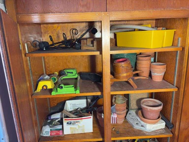 (3) shelves of gardening items including planters, sprinklers, small hose & more