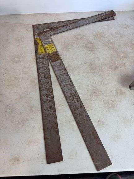 Small propane heater, carpenter's squares, and drill