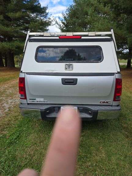2012 GMC Sierra 1500 4x4 w/ toolbox cap. Runs good. Has a weak battery.