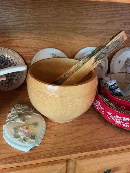 Shelf of glassware - plates, bowls, and more