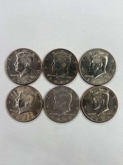 2002-P, 2002-P, 1989-D, 2006-P, 2006-P, 2011D Kennedy Half Dollars