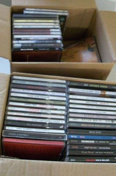 2 BOXES OF CDs