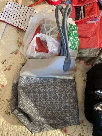 Large assortment of purses, tablecloths, and storage bags