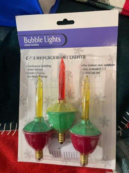 Assortment of Christmas items - books, decor, and more