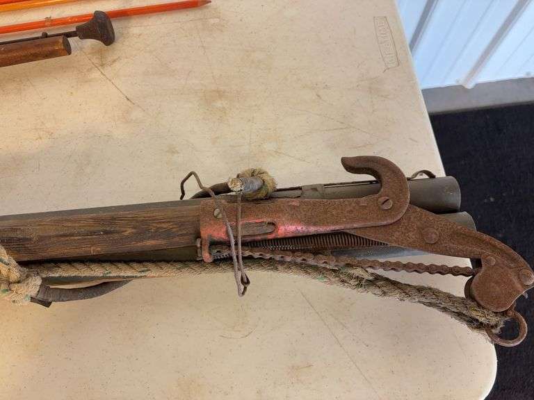 Yard markers, decorative shovel, branch trimmer, and antique piece