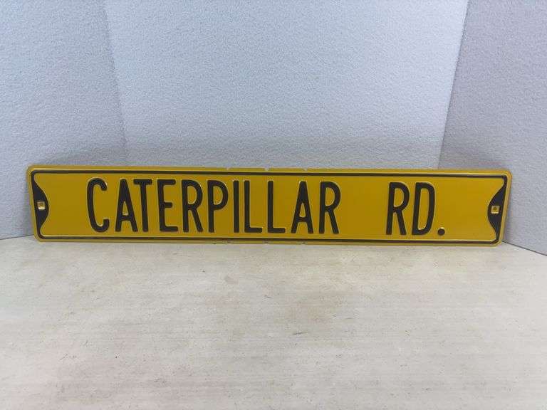 CATERPILLAR RD. Sign , Metal 36”x6”