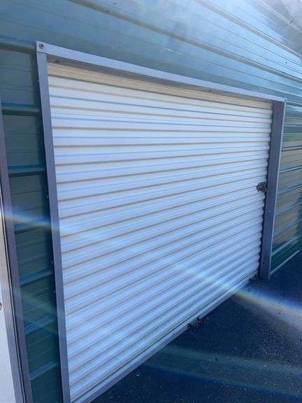 20x21 ft. Green metal Garage - w/ man door & garage door