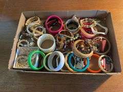 Flat of costume jewelry - mostly bracelets