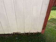 8x12 White and red storage barn - contents not included