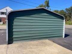 20x21 ft. Green metal Garage - w/ man door & garage door