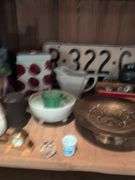 Shelf of decorative glassware pieces