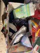 Large assortment of purses, tablecloths, and storage bags