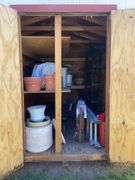 8x12 White and red storage barn - contents not included