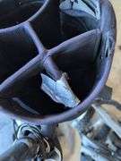 Wilson Staff golf bag and Sun Mountain bag carrier