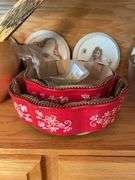 Shelf of glassware - plates, bowls, and more