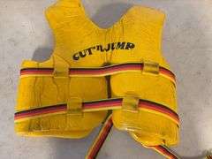 Bucket dolly, (2) life jackets, and string