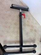 Adjustable roller stand, cable cutter, and Rockwell trim saw