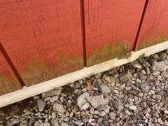 Red and white 8x12 storage barn - contents not included