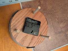 Advertisement yard sticks and (2) Dresden clocks