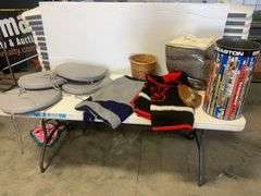 Blankets, seat cushions, Easton trash bin, and basket