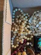 Flat of costume jewelry - mostly necklaces