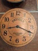 Advertisement yard sticks and (2) Dresden clocks