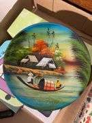 Decorative plates and vintage books