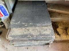 Metal storage shelf w/ slate pieces & bricks