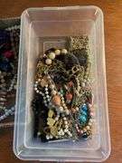 Flat of costume jewelry - mostly necklaces