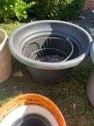 (2) large plastic planters, ceramic planter & decorative basket planter covers