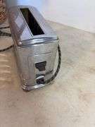 Basket with apple slicer, toaster, and deep fryer