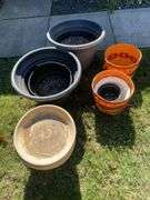 (2) large plastic planters, ceramic planter & decorative basket planter covers