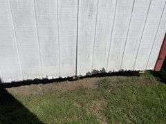 8x12 White and red storage barn - contents not included