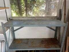 Metal storage shelf w/ slate pieces & bricks