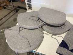 Blankets, seat cushions, Easton trash bin, and basket