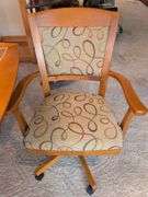 Matching dining table and (6) swivel chairs