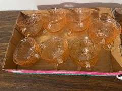 Pink depression glass mugs and sugar/cream containers