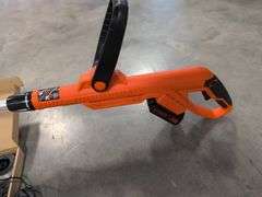 Black and Decker electric trimmer with charger and extra line/caps