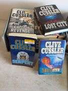 Large assortment of Clive Cussler books and other books