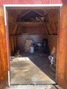 Red and white 8x12 storage barn - contents not included