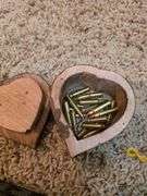 Handwarmer, knife & small wooden box with loose ammo