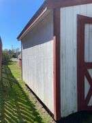 8x12 White and red storage barn - contents not included