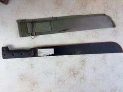 (2) machettes, Cabela's knife, and stainless mesh