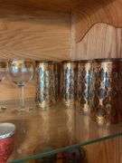 (2) shelves of glassware - stem, drinking cups, and more