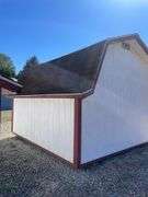 10x12 white and red storage barn - contents not included