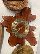 Decorative clock, baskets, and wooden pieces