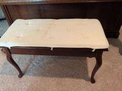 Young piano with bench seat