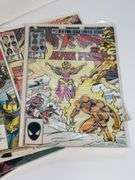 (8) X-Men Comic Books