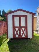 8x12 White and red storage barn - contents not included