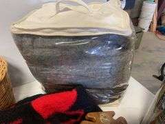 Blankets, seat cushions, Easton trash bin, and basket